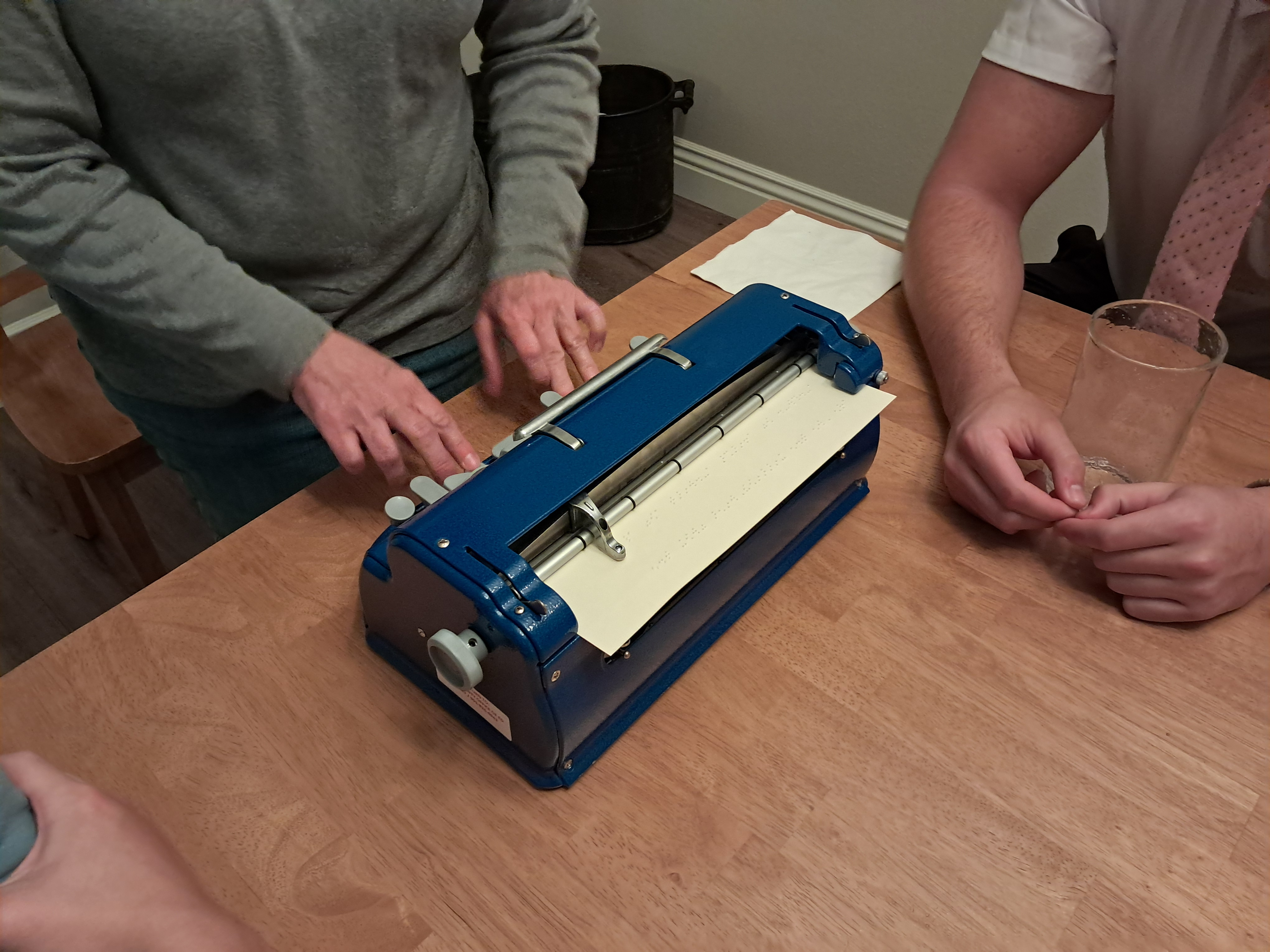 Friday. Our meal with the Fenstermachers. She is fluent in braille. This is a
braille typewriter. She instructed us on how to write our names!