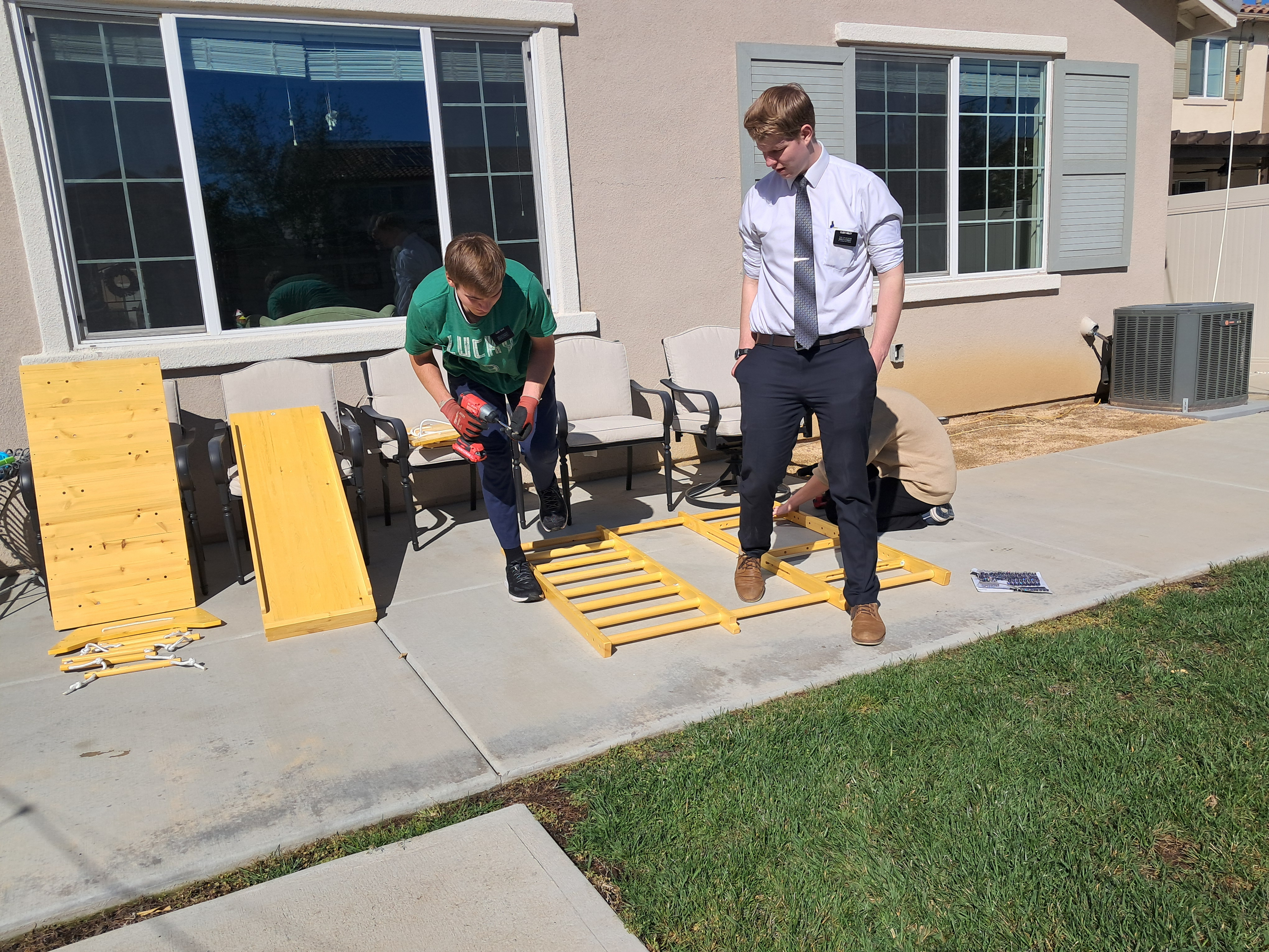 Saturday. Service project for an older lady in our ward. I really got to use my pre-mission building experience with assembling the
play set!