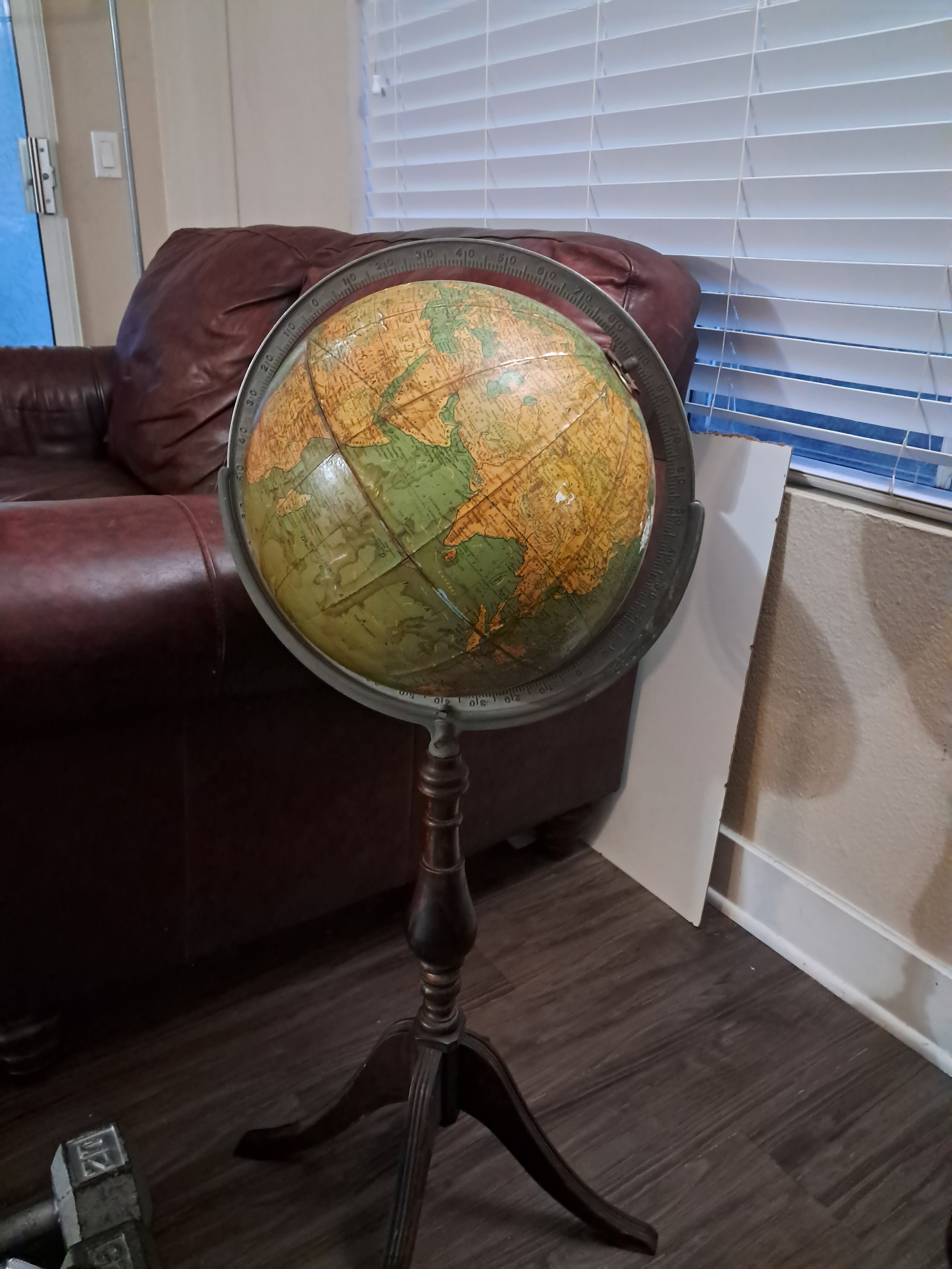 This globe came from who knows where. We found it in our car garage and we have determined that it was made before World War II. Really cool but it has a lot of stains on it.