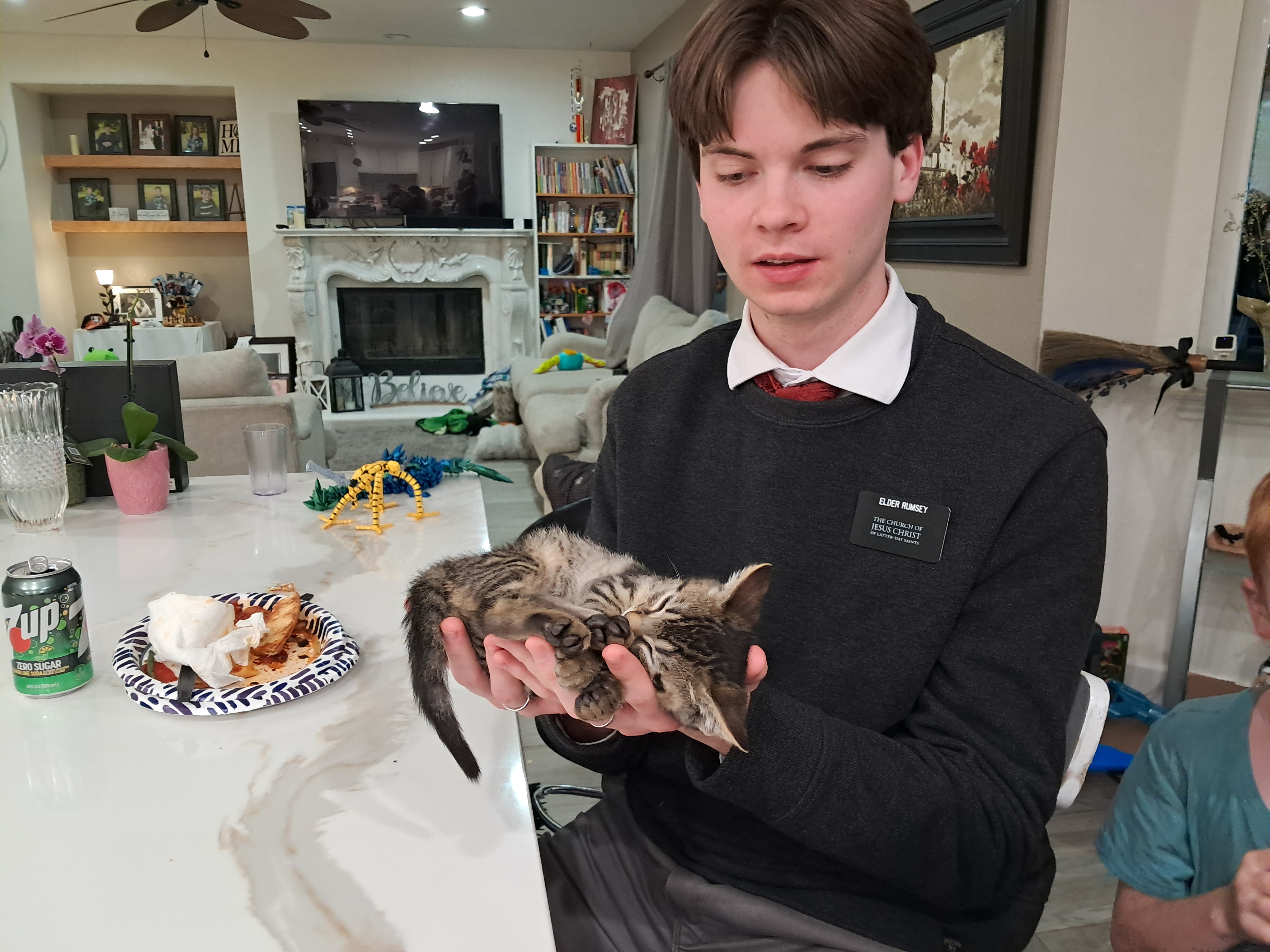 My last dinner with the Churchills.
They got two kittens and Brother Churchill picked up his sleeping kitten and placed it in Elder Rumsey's hands with his permission of course. SO ADORABLE!!!! It was so funny to see him pick up the kitten and place it in his hands and the kitten was just chilling!