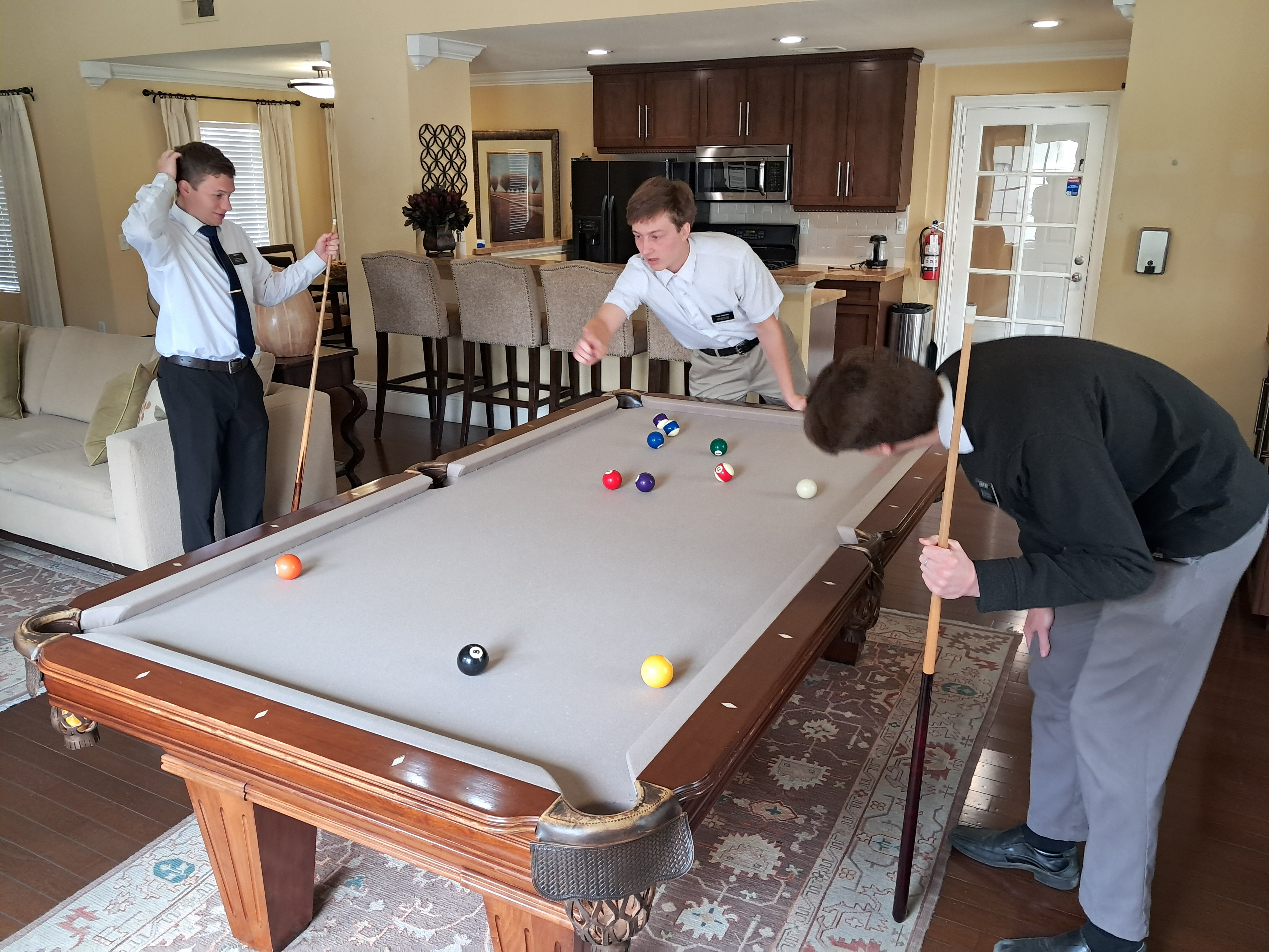 Us playing pool at the lobby.
