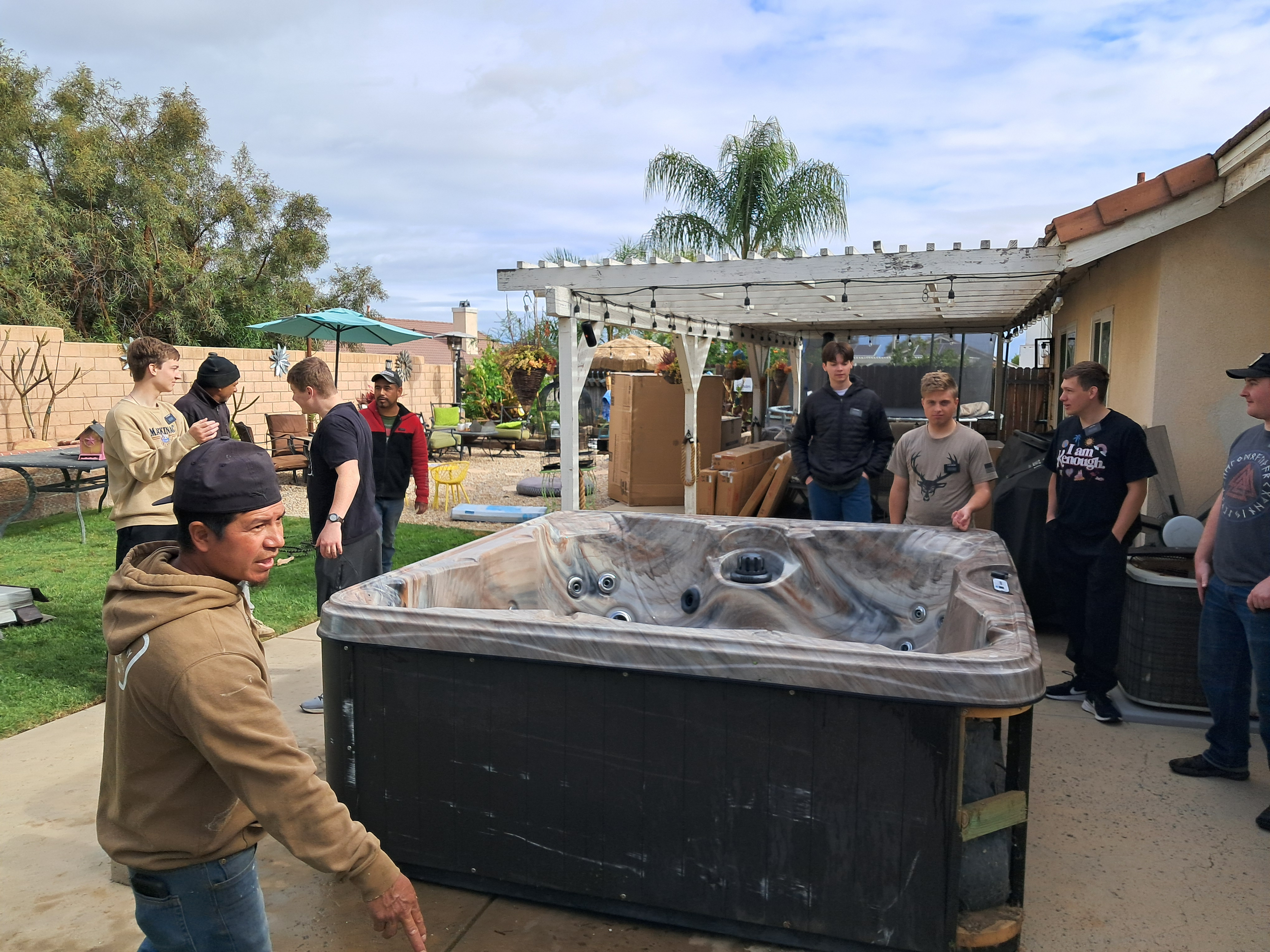 Us moving a fifteen hundred pound hot tub for a member. I know they were trying to save some money but it really should have been done by professionals. It was a little too dangerous for eight to ten eighteen and nineteen years olds.