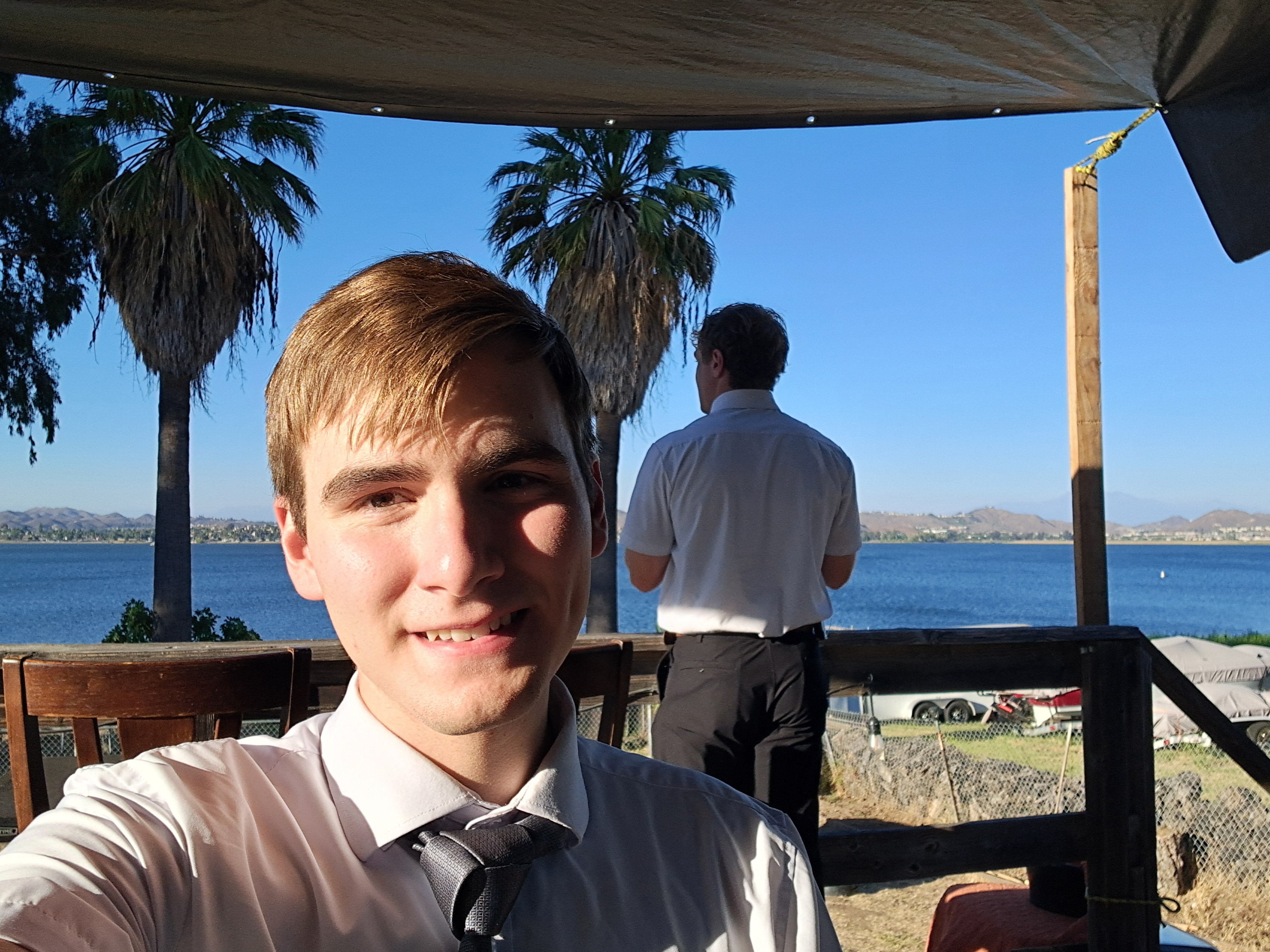 This is me at a Spanish members house for dinner. (Elder Roundy is the only other Elder that came with me to the mission field. He is the one in the background.)