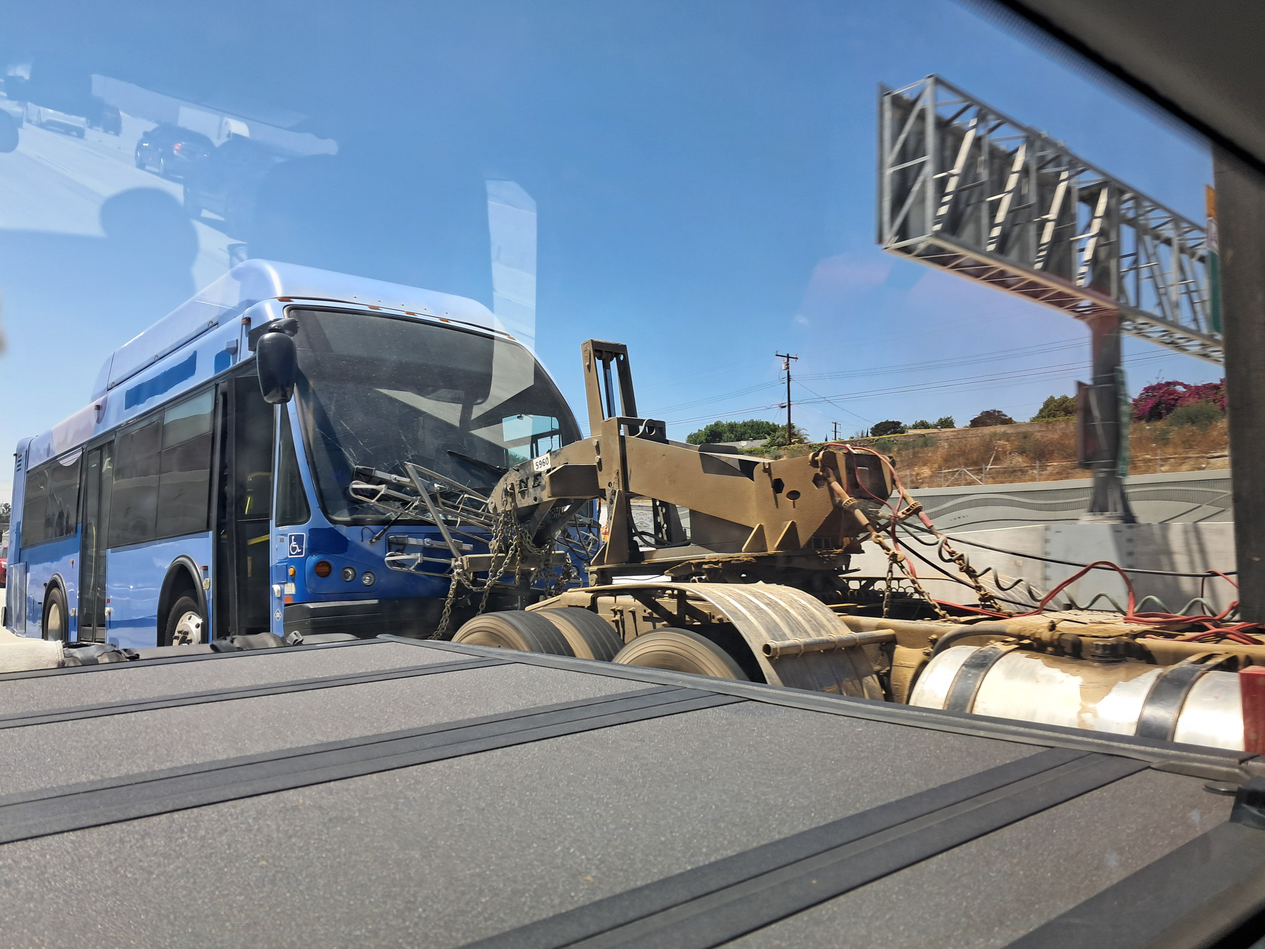 Bus getting a tow.