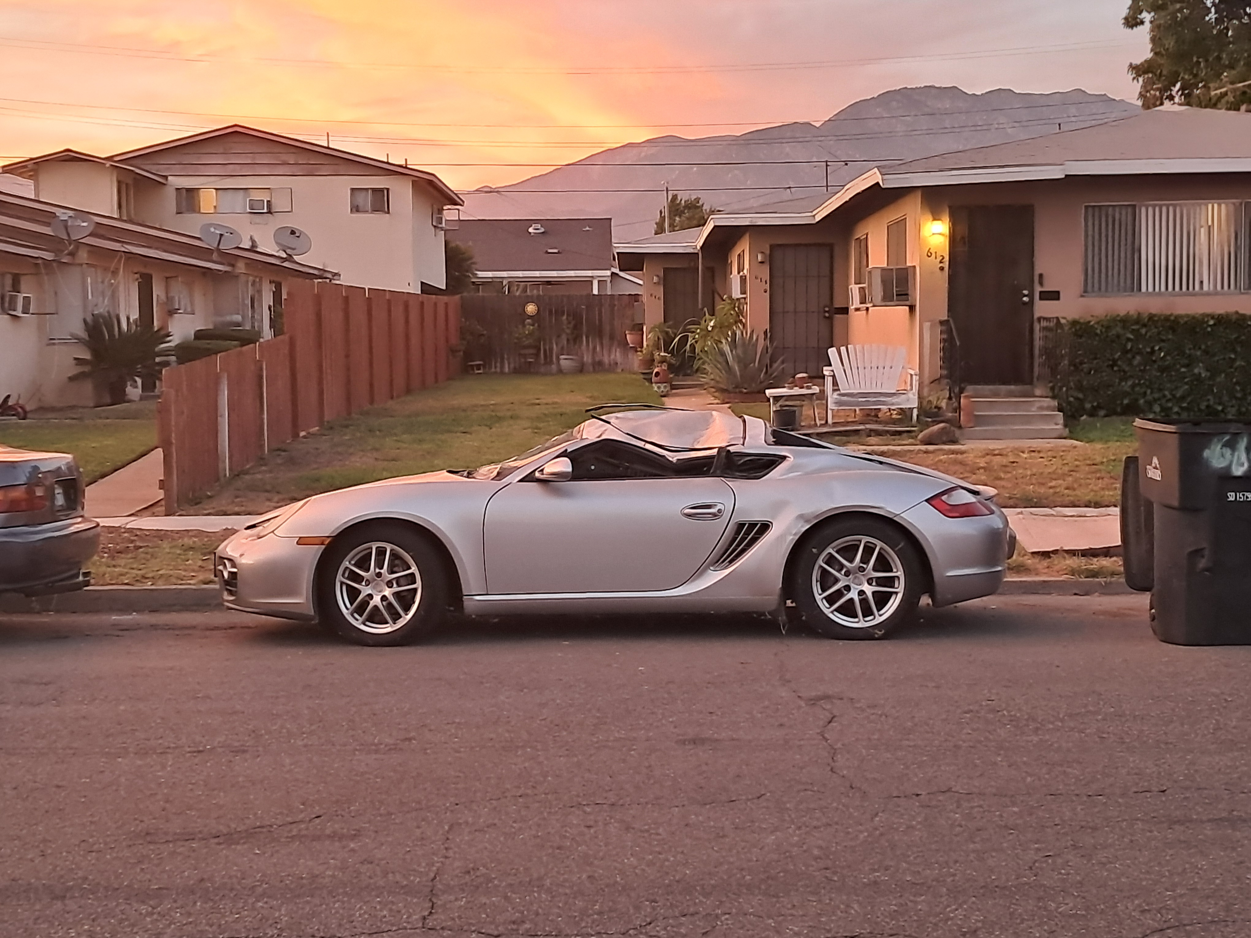 We were talking to the owner of this car and he said that a tree branch randomly fell on it (there wasn't any storm or even wind. The branch just fell).  Since it was on the street the city is paying for the repairs.