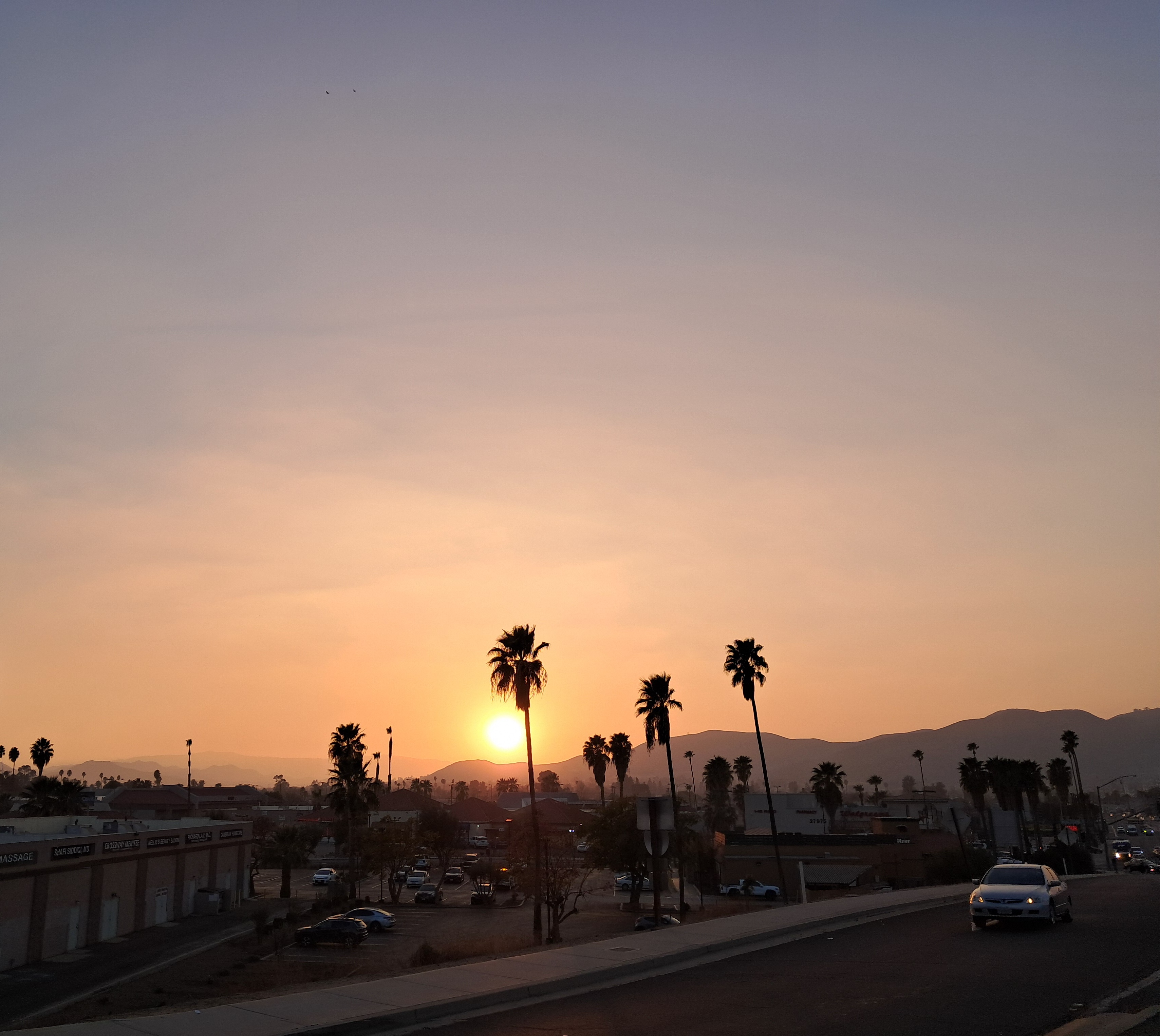 Orange sun (due to the smoke)